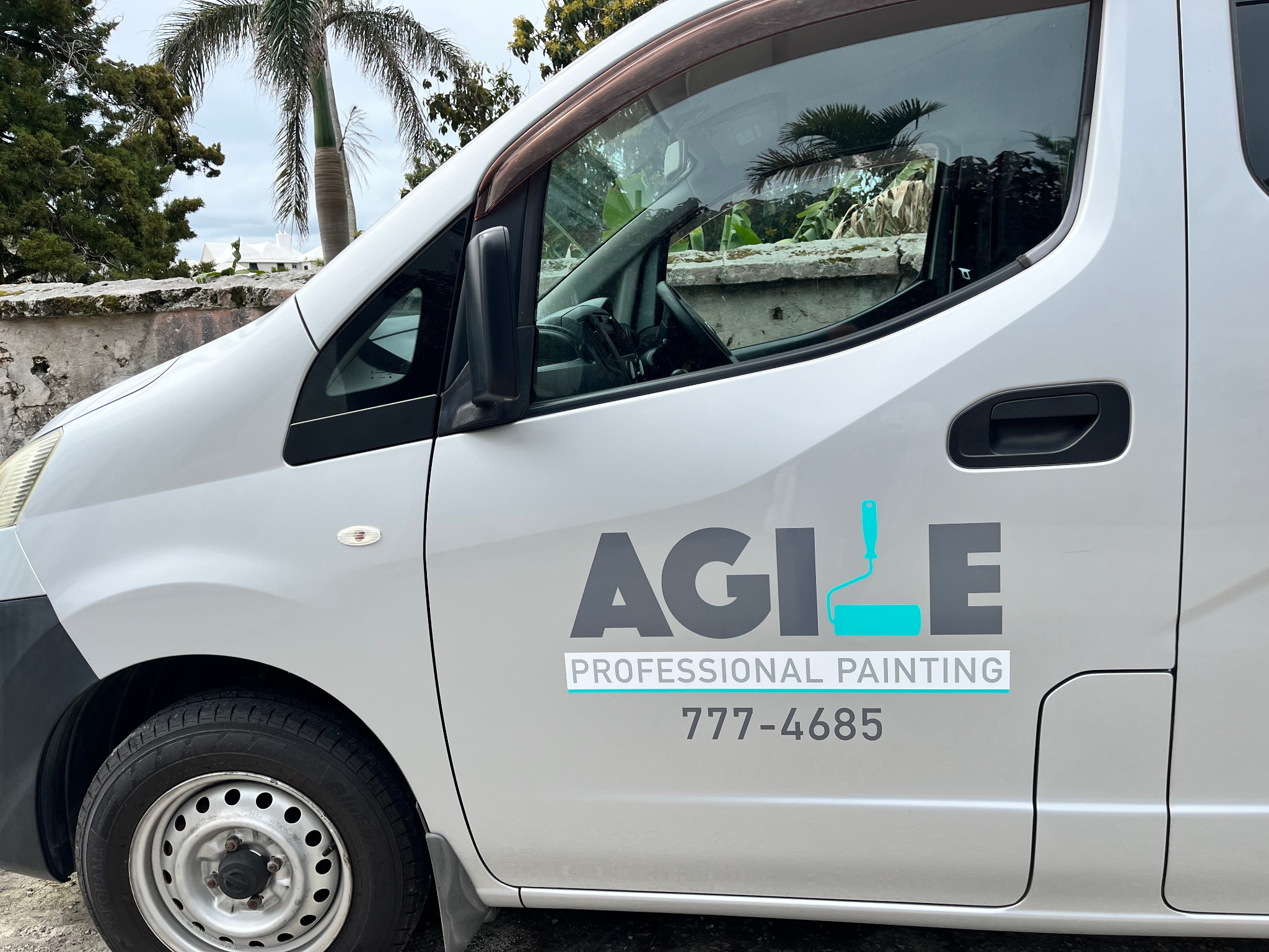 Agile Professional Painting logo applied to a silver work van
